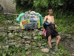 A Man Carring Diesel Generator
